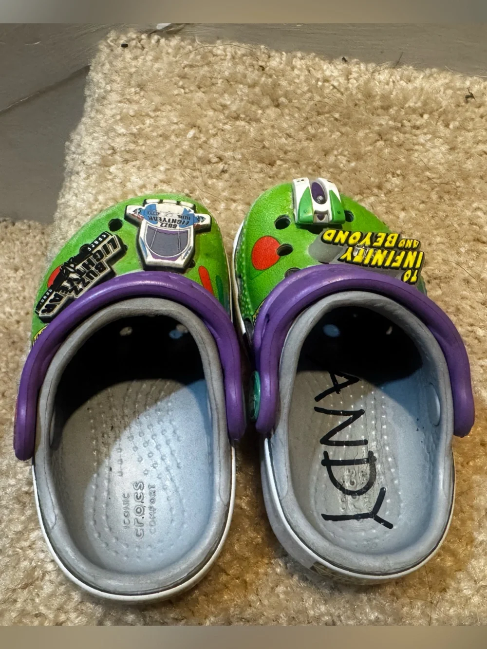 Toddlers Light Up Toy Story Crocs. Slight wear and tear visible in photos.